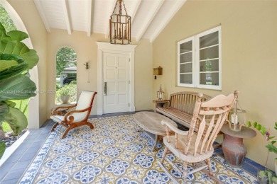 Set on an oversized 17,100-square-foot lot, nestled just around on Granada Golf Club in Florida - for sale on GolfHomes.com, golf home, golf lot