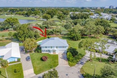 This One of a Kind Fully Renovated 5 Bedroom, 4 Bath Pool Home on BallenIsles Golf and Country Club in Florida - for sale on GolfHomes.com, golf home, golf lot