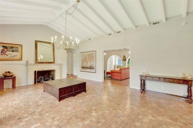 Set on an oversized 17,100-square-foot lot, nestled just around on Granada Golf Club in Florida - for sale on GolfHomes.com, golf home, golf lot