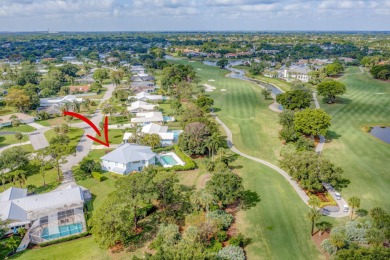 This One of a Kind Fully Renovated 5 Bedroom, 4 Bath Pool Home on BallenIsles Golf and Country Club in Florida - for sale on GolfHomes.com, golf home, golf lot