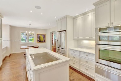 Set on an oversized 17,100-square-foot lot, nestled just around on Granada Golf Club in Florida - for sale on GolfHomes.com, golf home, golf lot