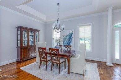 Enjoy elegance on the fairway in this stunning home tucked away on Carolina Colours Golf Club in North Carolina - for sale on GolfHomes.com, golf home, golf lot