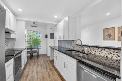 Delray's best kept secret! This beautiful and spacious condo is on Hamlet Country Club in Florida - for sale on GolfHomes.com, golf home, golf lot