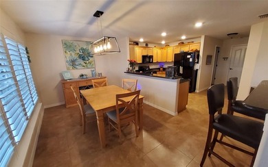 Welcome to your energy efficient home equipped with a new roof on Arlington Ridge Golf Club in Florida - for sale on GolfHomes.com, golf home, golf lot