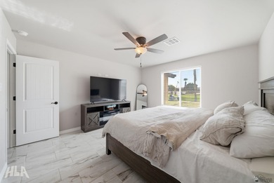 Beautiful 2024-built 3-bedroom, 2-bath home offering on The Links At Coyote Wash in Arizona - for sale on GolfHomes.com, golf home, golf lot