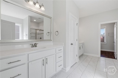 Turnkey. Lagoon Views. Gated Community Living. Enjoy easy on Savannah Quarters Country Club in Georgia - for sale on GolfHomes.com, golf home, golf lot