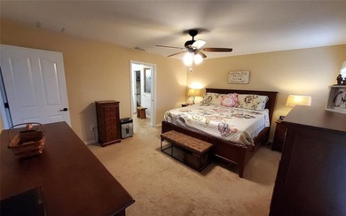 Welcome to your energy efficient home equipped with a new roof on Arlington Ridge Golf Club in Florida - for sale on GolfHomes.com, golf home, golf lot