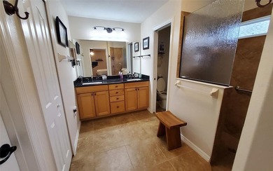 Welcome to your energy efficient home equipped with a new roof on Arlington Ridge Golf Club in Florida - for sale on GolfHomes.com, golf home, golf lot