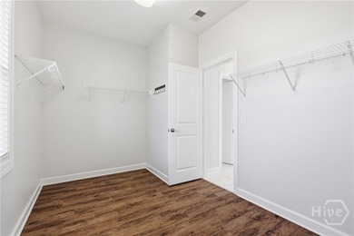 Turnkey. Lagoon Views. Gated Community Living. Enjoy easy on Savannah Quarters Country Club in Georgia - for sale on GolfHomes.com, golf home, golf lot