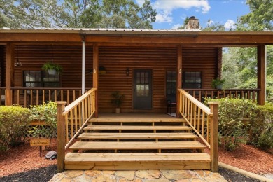 Custom Cypress Log Home Cabin located in the heart of Chiefland on Chiefland Golf and Country Club in Florida - for sale on GolfHomes.com, golf home, golf lot