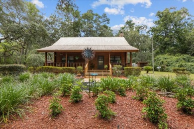 Custom Cypress Log Home Cabin located in the heart of Chiefland on Chiefland Golf and Country Club in Florida - for sale on GolfHomes.com, golf home, golf lot