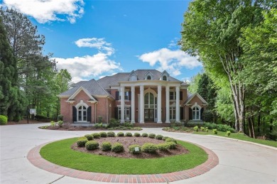 Welcome home to this gated brick and stone property built on on TPC At Sugarloaf Golf Club in Georgia - for sale on GolfHomes.com, golf home, golf lot