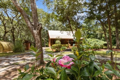 Custom Cypress Log Home Cabin located in the heart of Chiefland on Chiefland Golf and Country Club in Florida - for sale on GolfHomes.com, golf home, golf lot