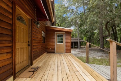 Custom Cypress Log Home Cabin located in the heart of Chiefland on Chiefland Golf and Country Club in Florida - for sale on GolfHomes.com, golf home, golf lot