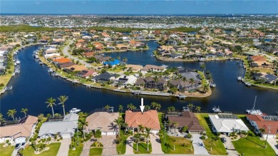 Experience exceptional waterfront living in this custom-built on Twin Isles Country Club in Florida - for sale on GolfHomes.com, golf home, golf lot