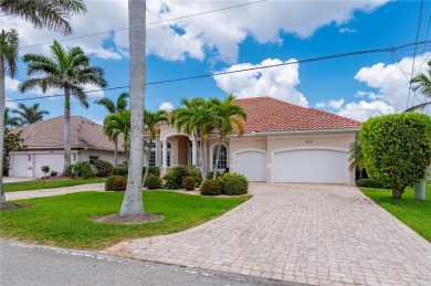Experience exceptional waterfront living in this custom-built on Twin Isles Country Club in Florida - for sale on GolfHomes.com, golf home, golf lot