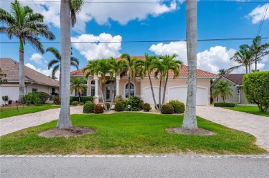 Experience exceptional waterfront living in this custom-built on Twin Isles Country Club in Florida - for sale on GolfHomes.com, golf home, golf lot
