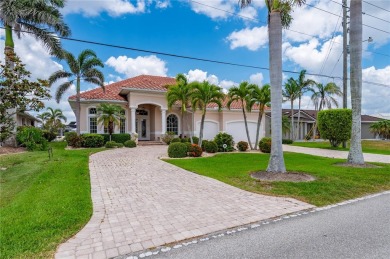 Experience exceptional waterfront living in this custom-built on Twin Isles Country Club in Florida - for sale on GolfHomes.com, golf home, golf lot