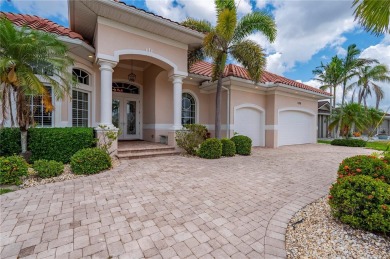 Experience exceptional waterfront living in this custom-built on Twin Isles Country Club in Florida - for sale on GolfHomes.com, golf home, golf lot