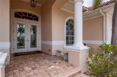 Experience exceptional waterfront living in this custom-built on Twin Isles Country Club in Florida - for sale on GolfHomes.com, golf home, golf lot