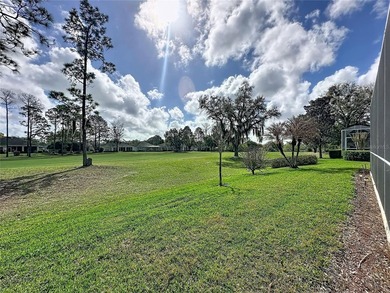 Nicely updated Sr James model located on the Championship course on Kings Ridge Golf Club in Florida - for sale on GolfHomes.com, golf home, golf lot