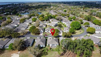 Nicely updated Sr James model located on the Championship course on Kings Ridge Golf Club in Florida - for sale on GolfHomes.com, golf home, golf lot