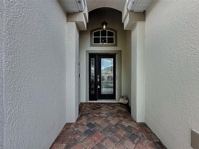 Nicely updated Sr James model located on the Championship course on Kings Ridge Golf Club in Florida - for sale on GolfHomes.com, golf home, golf lot