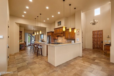 From the moment you arrive, the home unfolds with intention on Sedona Golf Resort in Arizona - for sale on GolfHomes.com, golf home, golf lot