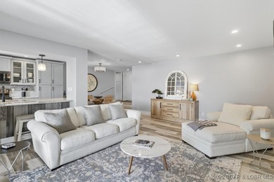 This truly spectacular Walk-in level Waterfront condo. Has on Seasons Ridge At Four Seasons in Missouri - for sale on GolfHomes.com, golf home, golf lot