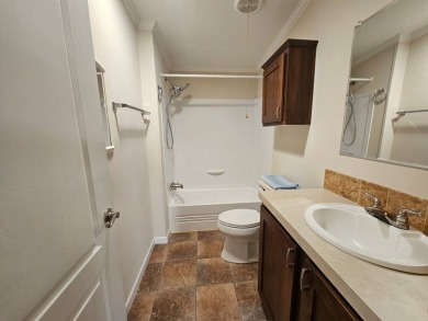 Located in a 55+ resort-style manufactured home community on on Big Cypress Golf and Country Club in Florida - for sale on GolfHomes.com, golf home, golf lot