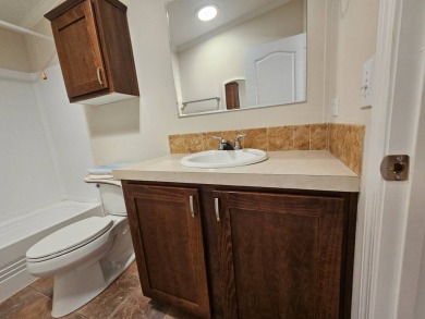 Located in a 55+ resort-style manufactured home community on on Big Cypress Golf and Country Club in Florida - for sale on GolfHomes.com, golf home, golf lot