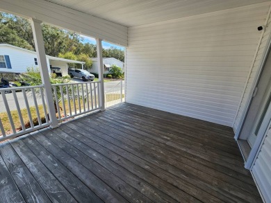 Located in a 55+ resort-style manufactured home community on on Big Cypress Golf and Country Club in Florida - for sale on GolfHomes.com, golf home, golf lot