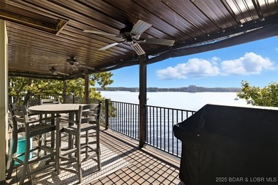 This truly spectacular Walk-in level Waterfront condo. Has on Seasons Ridge At Four Seasons in Missouri - for sale on GolfHomes.com, golf home, golf lot