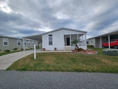Located in a 55+ resort-style manufactured home community on on Big Cypress Golf and Country Club in Florida - for sale on GolfHomes.com, golf home, golf lot