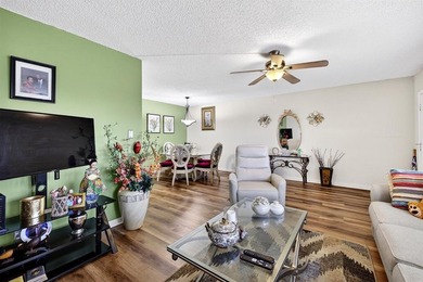 BEAUTIFUL 1 BEDRM-1+1/2 BATHRMS WITH INSIDE WASHER & DRYER on Wynmoor Golf Course in Florida - for sale on GolfHomes.com, golf home, golf lot