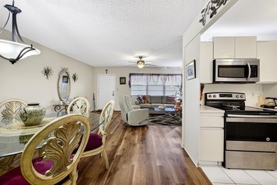 BEAUTIFUL 1 BEDRM-1+1/2 BATHRMS WITH INSIDE WASHER & DRYER on Wynmoor Golf Course in Florida - for sale on GolfHomes.com, golf home, golf lot