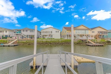 Welcome to your completely renovated Cherry Grove canal home on Beachwood Golf Club in South Carolina - for sale on GolfHomes.com, golf home, golf lot