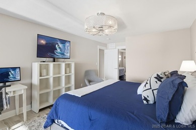 This truly spectacular Walk-in level Waterfront condo. Has on Seasons Ridge At Four Seasons in Missouri - for sale on GolfHomes.com, golf home, golf lot