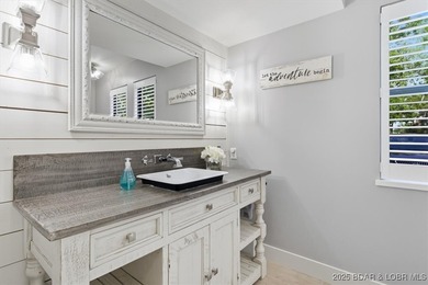 This truly spectacular Walk-in level Waterfront condo. Has on Seasons Ridge At Four Seasons in Missouri - for sale on GolfHomes.com, golf home, golf lot