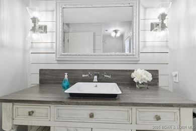 This truly spectacular Walk-in level Waterfront condo. Has on Seasons Ridge At Four Seasons in Missouri - for sale on GolfHomes.com, golf home, golf lot