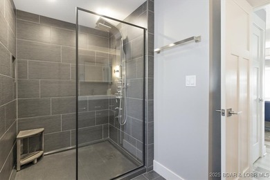 This truly spectacular Walk-in level Waterfront condo. Has on Seasons Ridge At Four Seasons in Missouri - for sale on GolfHomes.com, golf home, golf lot