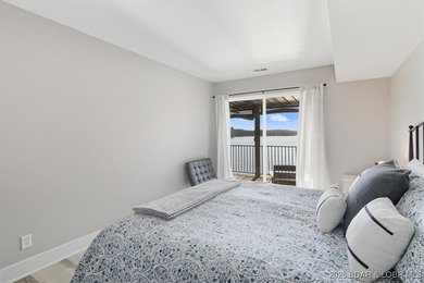This truly spectacular Walk-in level Waterfront condo. Has on Seasons Ridge At Four Seasons in Missouri - for sale on GolfHomes.com, golf home, golf lot
