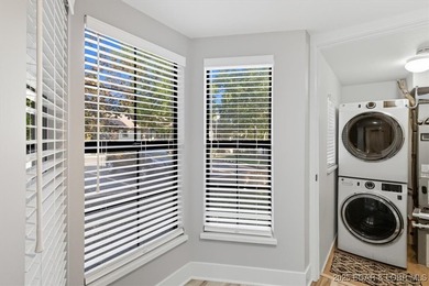 This truly spectacular Walk-in level Waterfront condo. Has on Seasons Ridge At Four Seasons in Missouri - for sale on GolfHomes.com, golf home, golf lot