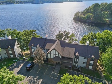 This truly spectacular Walk-in level Waterfront condo. Has on Seasons Ridge At Four Seasons in Missouri - for sale on GolfHomes.com, golf home, golf lot