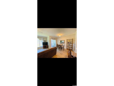 Adorable condo located in the lovely Myrtlewood Golf course on  in South Carolina - for sale on GolfHomes.com, golf home, golf lot