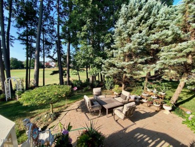 Welcome to this beautifully maintained brick-front home nestled on Brier Creek Country Club in North Carolina - for sale on GolfHomes.com, golf home, golf lot
