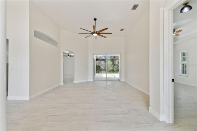 Welcome to 13792 Long Lake, a fully remodeled luxury residence on Riverwood Golf Club in Florida - for sale on GolfHomes.com, golf home, golf lot