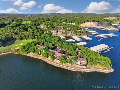 This truly spectacular Walk-in level Waterfront condo. Has on Seasons Ridge At Four Seasons in Missouri - for sale on GolfHomes.com, golf home, golf lot