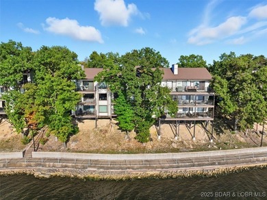 This truly spectacular Walk-in level Waterfront condo. Has on Seasons Ridge At Four Seasons in Missouri - for sale on GolfHomes.com, golf home, golf lot