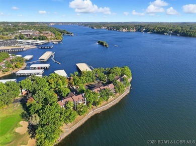 This truly spectacular Walk-in level Waterfront condo. Has on Seasons Ridge At Four Seasons in Missouri - for sale on GolfHomes.com, golf home, golf lot